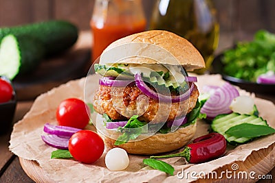 Spicy chicken burgers with tomato and eggplant - sandwich. Stock Photo
