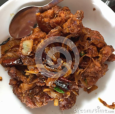 Spicy chilli chicken served hot in an Indian restaurant Stock Photo