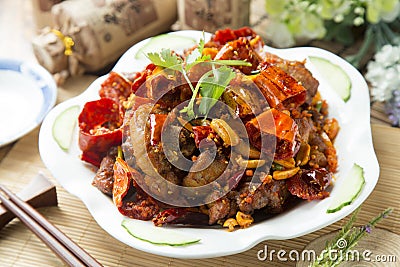 Spicy chinese braised pork on white plate Stock Photo