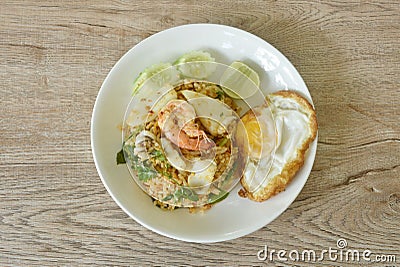 spicy fried rice seafood shrimp and squid in tom yum sauce on plate Stock Photo