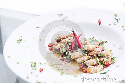 Spicy garlic prawns modern fusion gourmet food cuisine meal Stock Photo