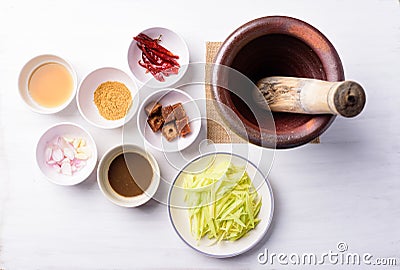 Spicy green mango salad Tum Ma Muang Stock Photo