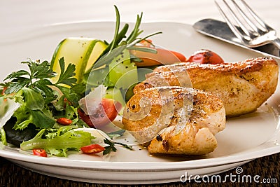 Spicy grilled chicken breast Stock Photo