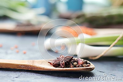 Spicy herbs, asparagus, lemons, seasonings, lentils on the kitchen table Stock Photo