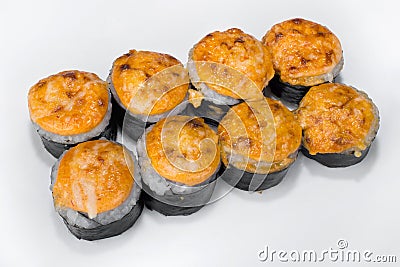 Spicy Japanese roll on a white plate Stock Photo