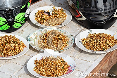 Spicy parched rice plates on the table Stock Photo