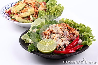 Spicy salad with cucumber served with spicy crab salad. Stock Photo