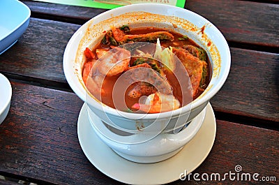 Spicy and Soup Curry with Vegetable and Accacia Leave Omelet and Stock Photo