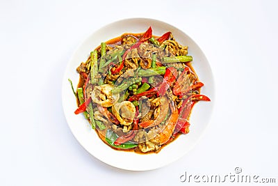 Spicy stir fried shimp, squid and pork with Thai Southern chili paste and longbean on white Stock Photo