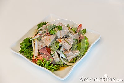 Spicy Vietnamese Sausage Salad on white background. Spicy Vietnamese Pork Sausage Salad with Vegetables Good Tasty Appetizer Healt Stock Photo