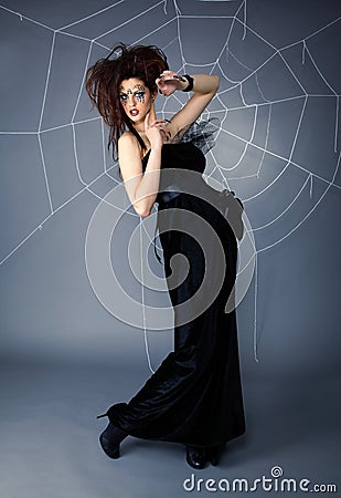 Spider girl and web Stock Photo