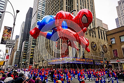 Spiderman balloon floats in the air during the annual Macy`s Thanksgiving Day parade along Avenue of Americas Editorial Stock Photo