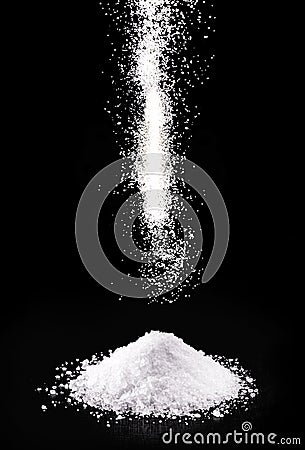 spilled calcium chloride falling. It is a chemical substance coarse salt used in the industry Stock Photo