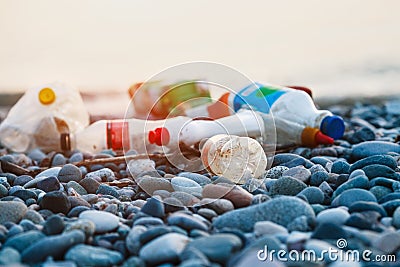 spilled garbage on city sea beach, environmental ecological problem Stock Photo