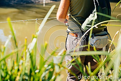 Spin fishing on a river Stock Photo