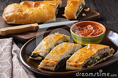 Spinach and cheese stromboli, italian cuisine. Stock Photo