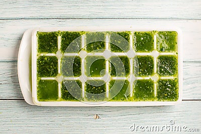 spinach ice cubes. frozen greens cubes Stock Photo