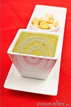 Spinach puree and bread croutons Stock Photo