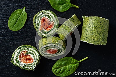 Spinach rolls with smoked salmon and cream cheese. Stock Photo