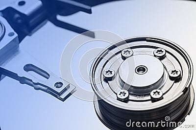 Spindle and plate open HDD with blue gradient color. Stock Photo