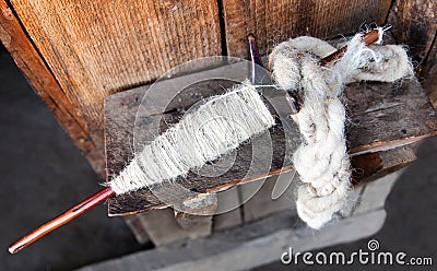 Spindle for spinning of yak, sheep or goat virgin wool Stock Photo