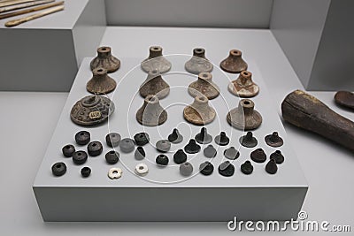 Spindle whorls and thread separators of pre-columbian cultures Editorial Stock Photo