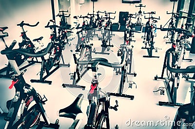 Spinning class with empty bikes Stock Photo