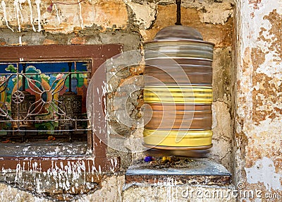 Spinning prayer wheel Stock Photo