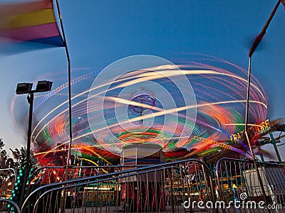 County Fair ride, at night, in motion. Gwinnett County, GA. Stock Photo