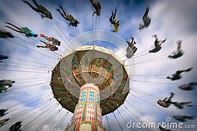 Spinning vintage swing ride Stock Photo