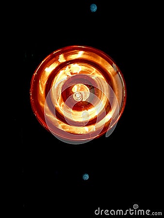 spiral light in lamp on black background Stock Photo