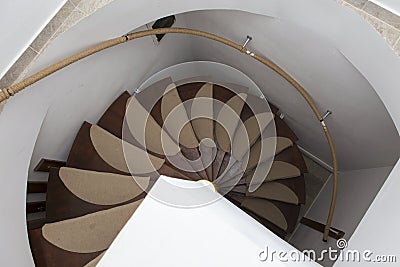 Spiral round stairway in a hotel Stock Photo