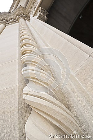 Spiral-shaped marble column of an ancient Italian classical church - Italy Stock Photo