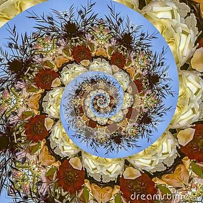 Spiral shapes made from flowers in circular arrangement at wedding in California Stock Photo