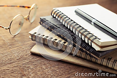 Pile of Notebooks for Writing Concept Stock Photo
