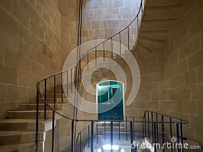 The spiral staircase in the Malta Maritime Museum in Vittoriosa. Malta. Editorial Stock Photo
