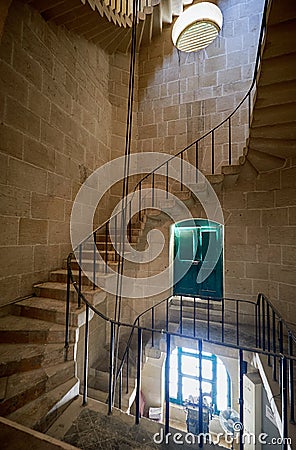 The spiral staircase in the Malta Maritime Museum in Vittoriosa. Editorial Stock Photo