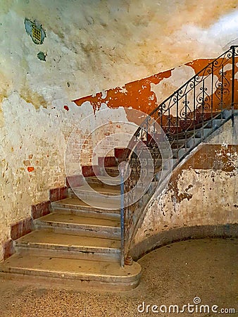 Spiral staircase in a very old apartment building in Hungary, Europe Stock Photo