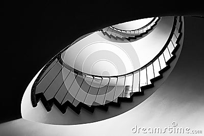 Spiral staircases with grey metal handrails Stock Photo