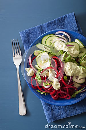 Spiralized beet and cucumber salad with avocado dressing, health Stock Photo