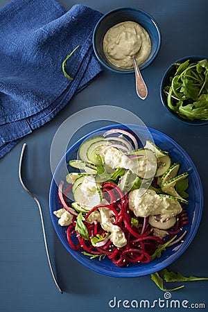 Spiralized beet and cucumber salad with avocado dressing, health Stock Photo