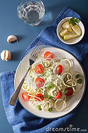 Spiralized courgette salad with avocado dressing, healthy vegan Stock Photo