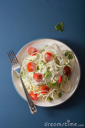 Spiralized courgette salad with avocado dressing, healthy vegan Stock Photo