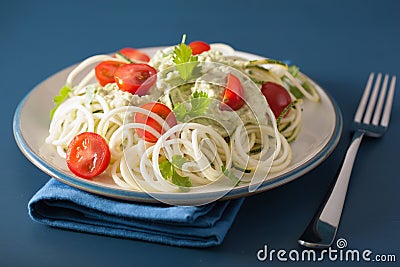 Spiralized courgette salad with avocado dressing, healthy vegan Stock Photo