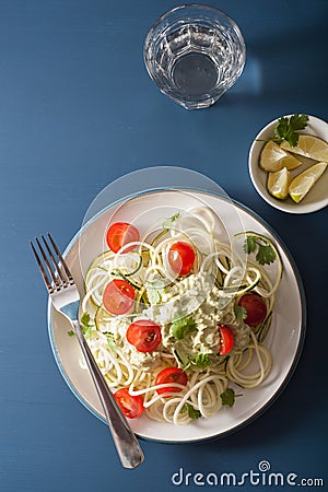 Spiralized courgette salad with avocado dressing, healthy vegan Stock Photo