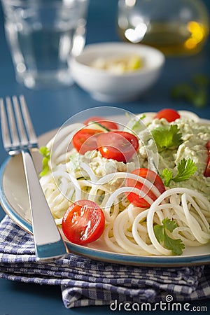 Spiralized courgette salad with avocado dressing, healthy vegan Stock Photo