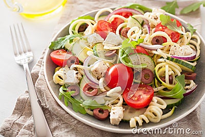 Spiralized courgette salad greek style with tomato feta olives c Stock Photo