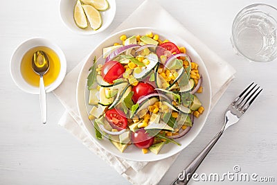 Spiralized courgette salad with sweetcorn tomato avocado, health Stock Photo