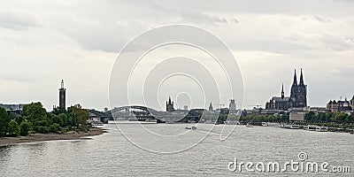 River Rhine in the city of Cologne,with cathedral and ther churches, Messeturm tower and railway bridge Editorial Stock Photo