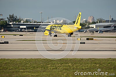 Spirit airplanes painted yellow at FLL Fort Lauderdale FL Editorial Stock Photo